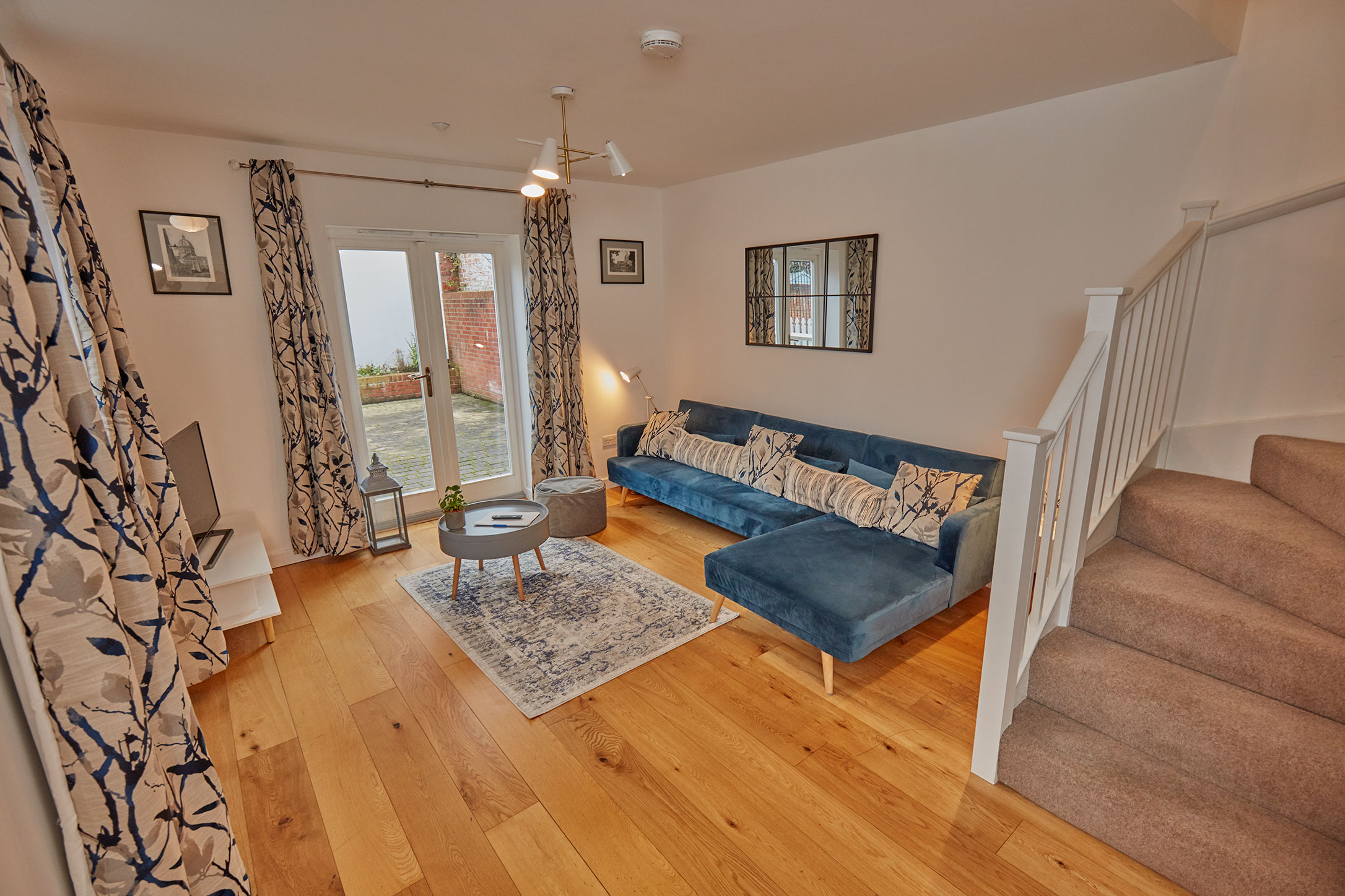 The sitting room opening onto the private patio